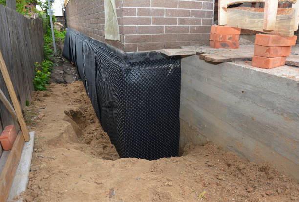 Happy homeowners after waterproofing job in Joint Base Mdl